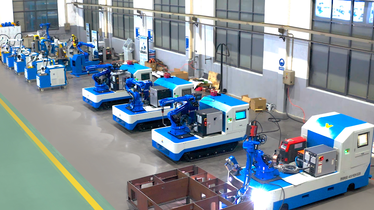 Cantilever welding robot workshop overview showing full production line setup